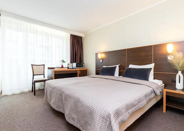 Alkos Namu Apartamentai * פלאנגה